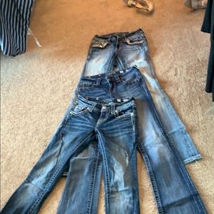 Miss Me jeans three pairs of size 25.  Bundle
